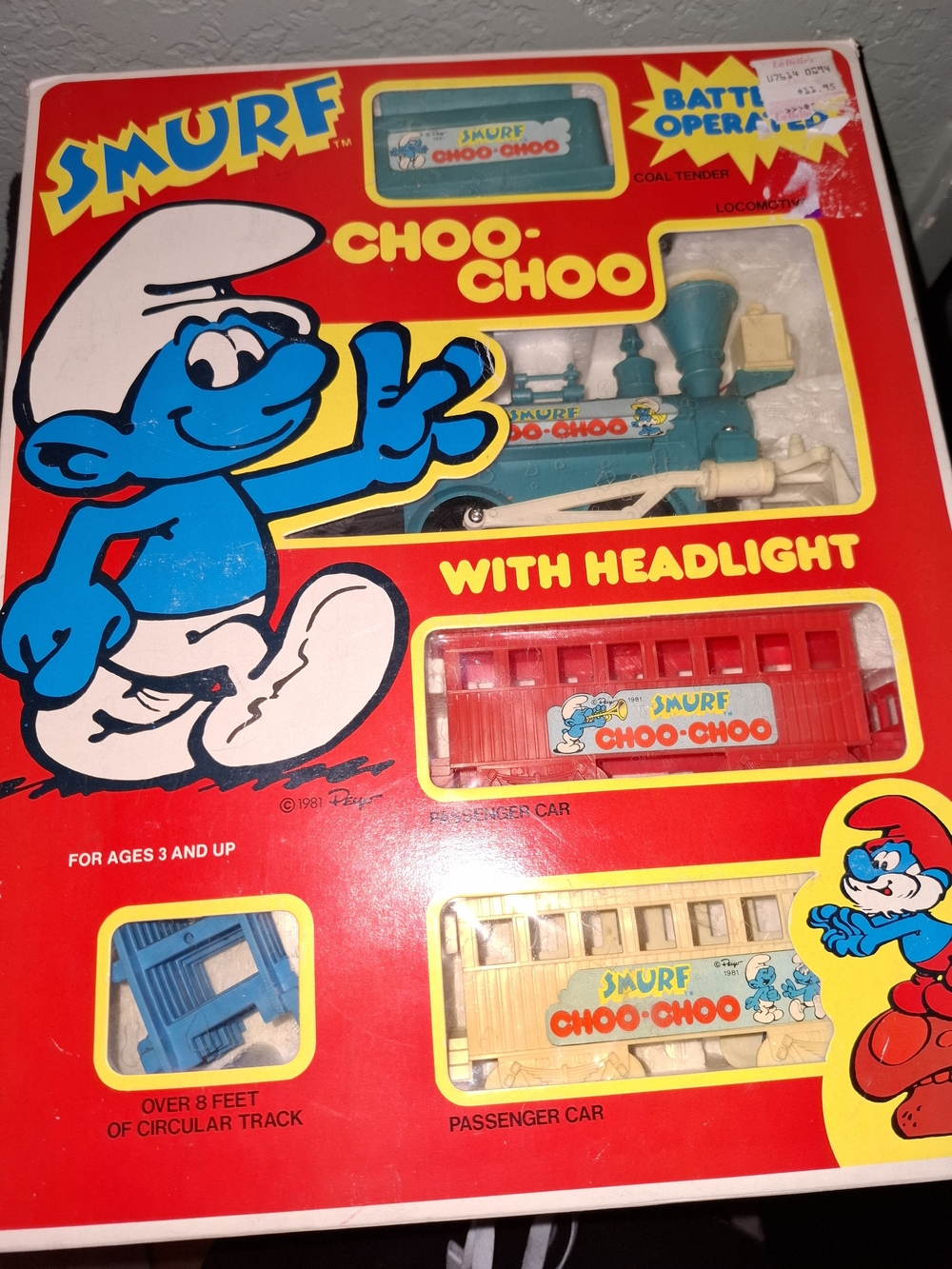 This is a vintage 1981 Smurf Choo-Choo battery-operated toy train set box produc